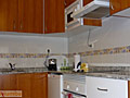 Cocina equipa Apartamentos San Isidro